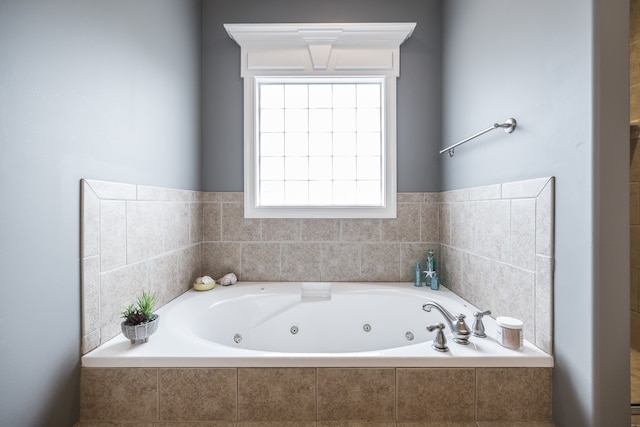 full bathroom featuring a whirlpool tub