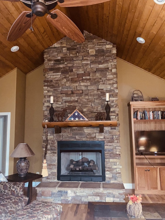 2271 Timberwood Trce, Monteagle, TN 37356 - living room with vaulted ceiling, a ceiling fan, wood ceiling, and a stone fireplace