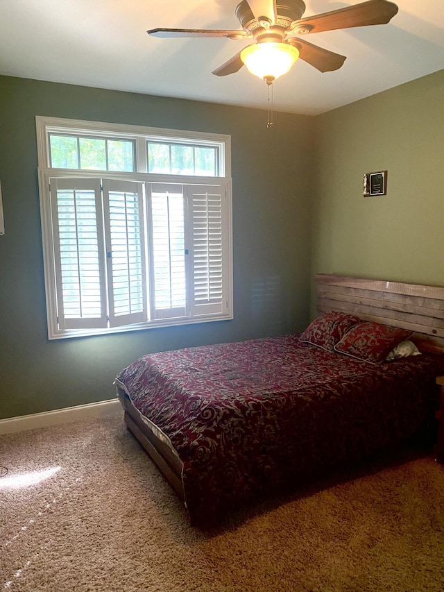 2271 Timberwood Trce, Monteagle, TN 37356 - bedroom with carpet floors, a ceiling fan, and baseboards