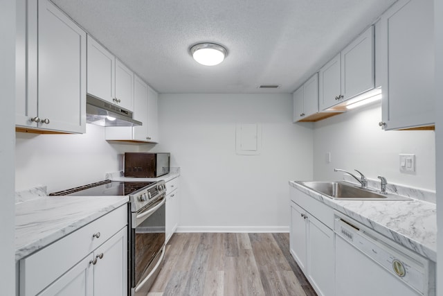 kitchen featuring white cabinetry, stainless steel range with electric cooktop, and white dishwasher