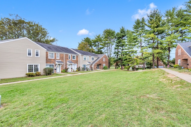 view of front of home with a front lawn