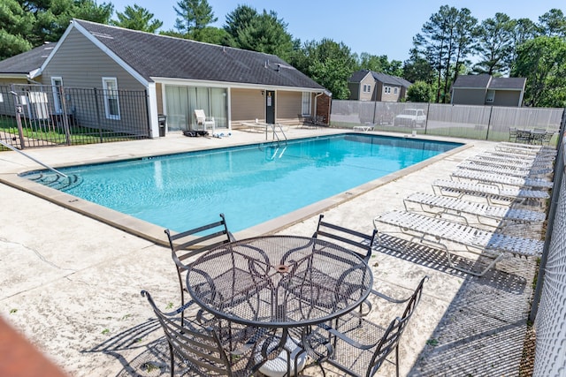 view of pool with a patio