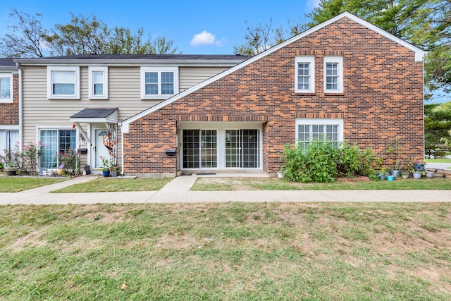 view of front facade with a front yard