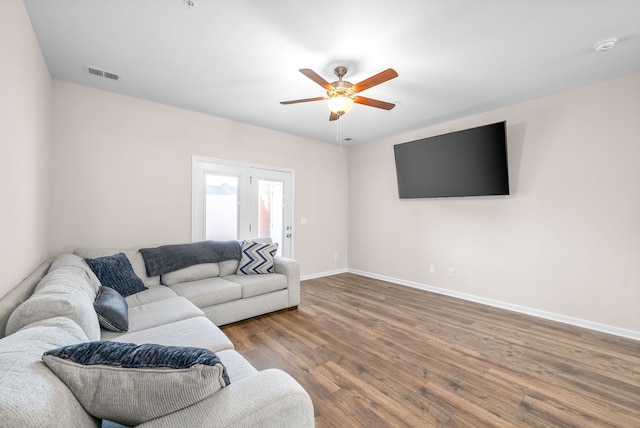 living room with french doors, hardwood / wood-style flooring, and ceiling fan