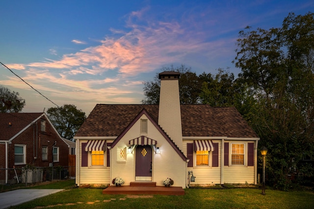 tudor house with a yard