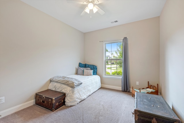 bedroom featuring ceiling fan and carpet floors