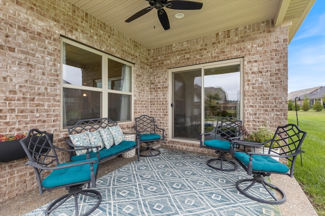 view of patio / terrace featuring ceiling fan