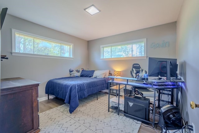 bedroom featuring light wood-type flooring