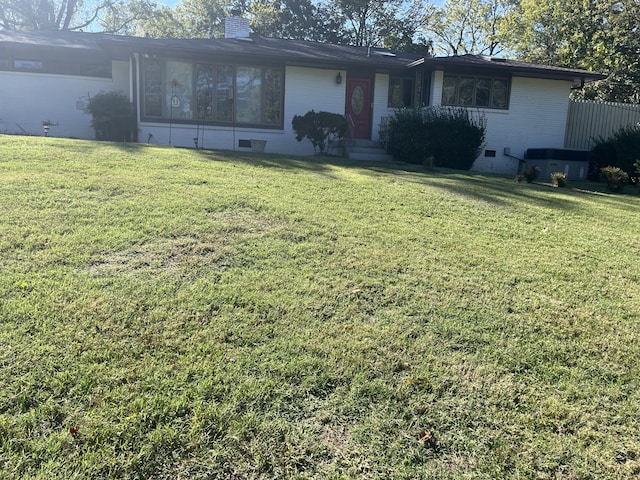 single story home with a front yard