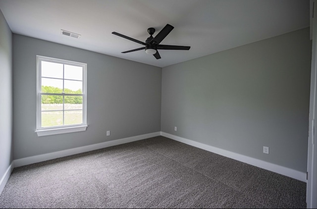 carpeted empty room with ceiling fan