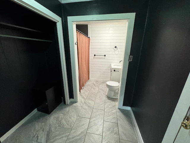 bathroom featuring toilet