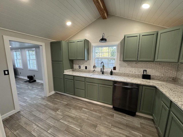 kitchen featuring tasteful backsplash, sink, dishwasher, green cabinetry, and light stone counters