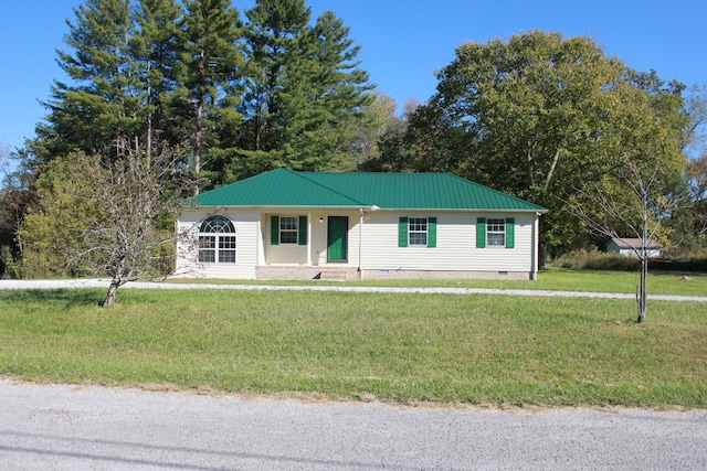 single story home featuring a front yard