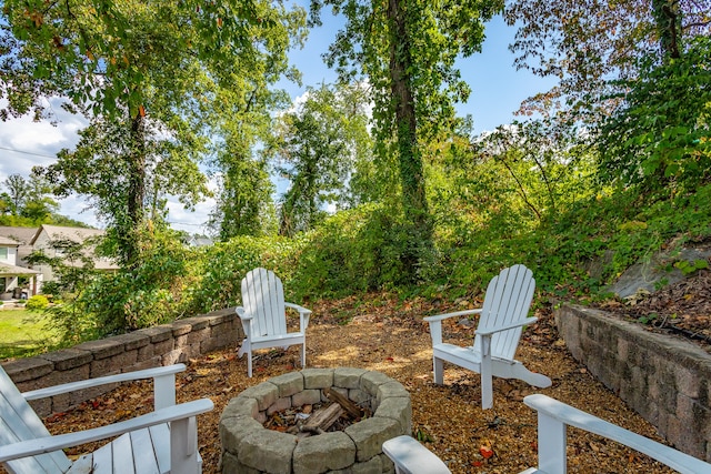 view of patio / terrace with a fire pit