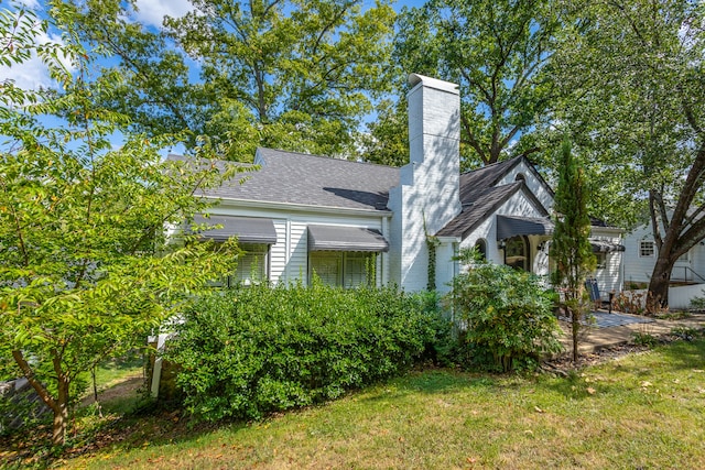 exterior space with a front yard