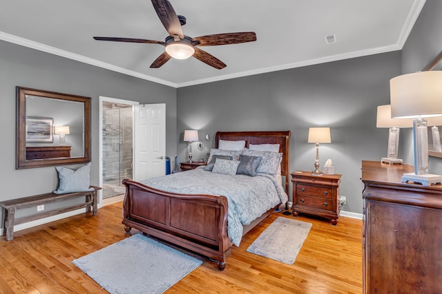 bedroom with ornamental molding, ensuite bathroom, light wood-type flooring, and ceiling fan