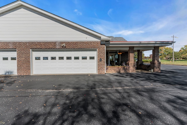 exterior space with a garage