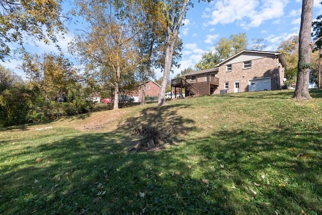 view of yard featuring a wooden deck