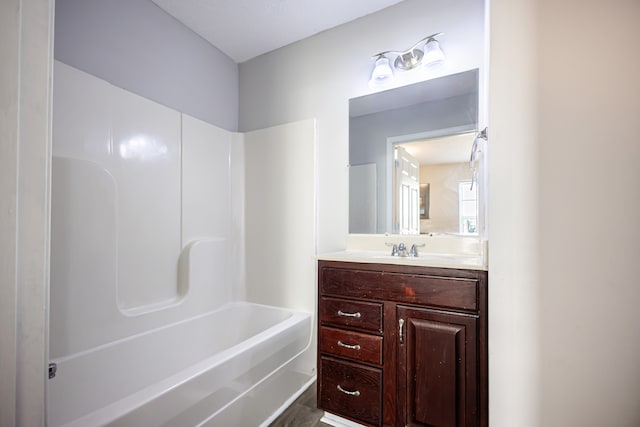 bathroom featuring vanity and shower / washtub combination