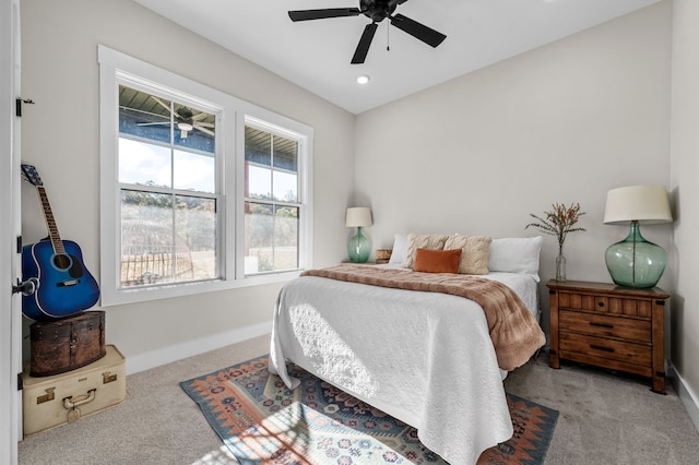 carpeted bedroom featuring recessed lighting, a ceiling fan, and baseboards