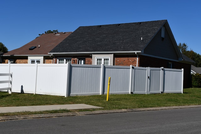 exterior space with a lawn