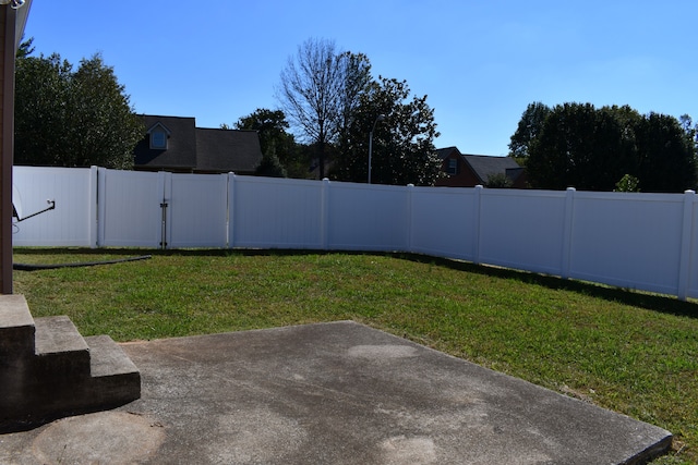 view of yard with a patio area