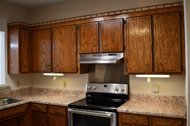 kitchen with sink and stainless steel electric range