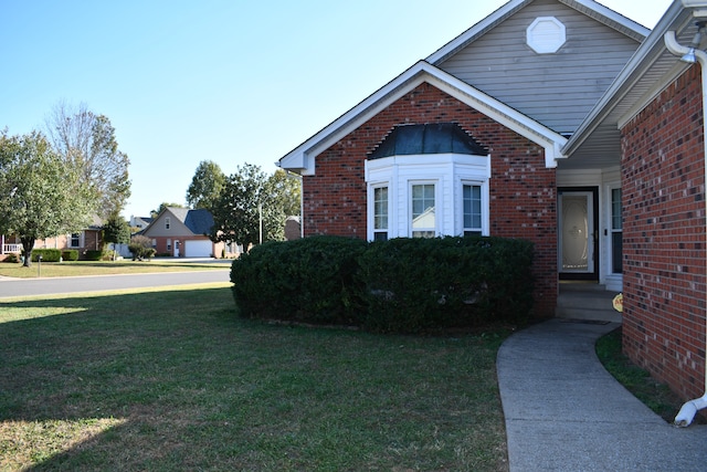 view of front of house featuring a front yard