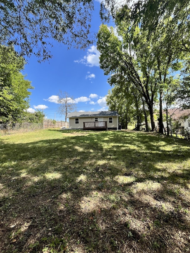 view of yard featuring a deck