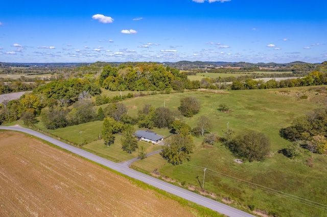 birds eye view of property featuring a rural view