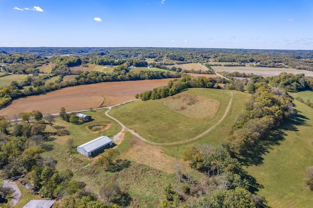 birds eye view of property featuring a rural view