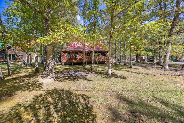 view of yard featuring a deck