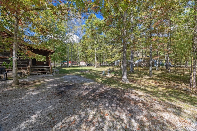 view of yard featuring a deck