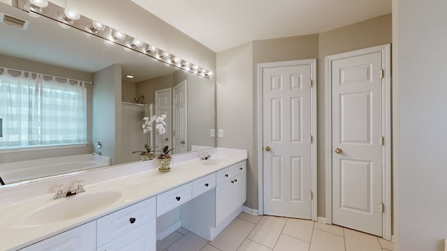 bathroom featuring vanity, separate shower and tub, and tile patterned flooring