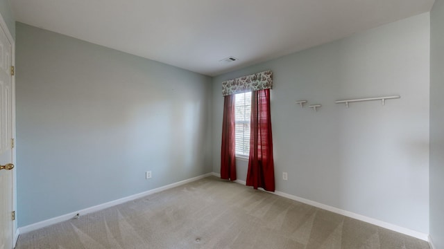 view of carpeted spare room