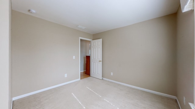 view of carpeted spare room