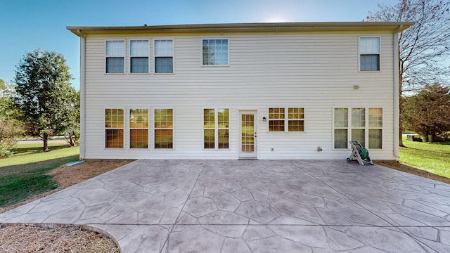 rear view of house with a patio area