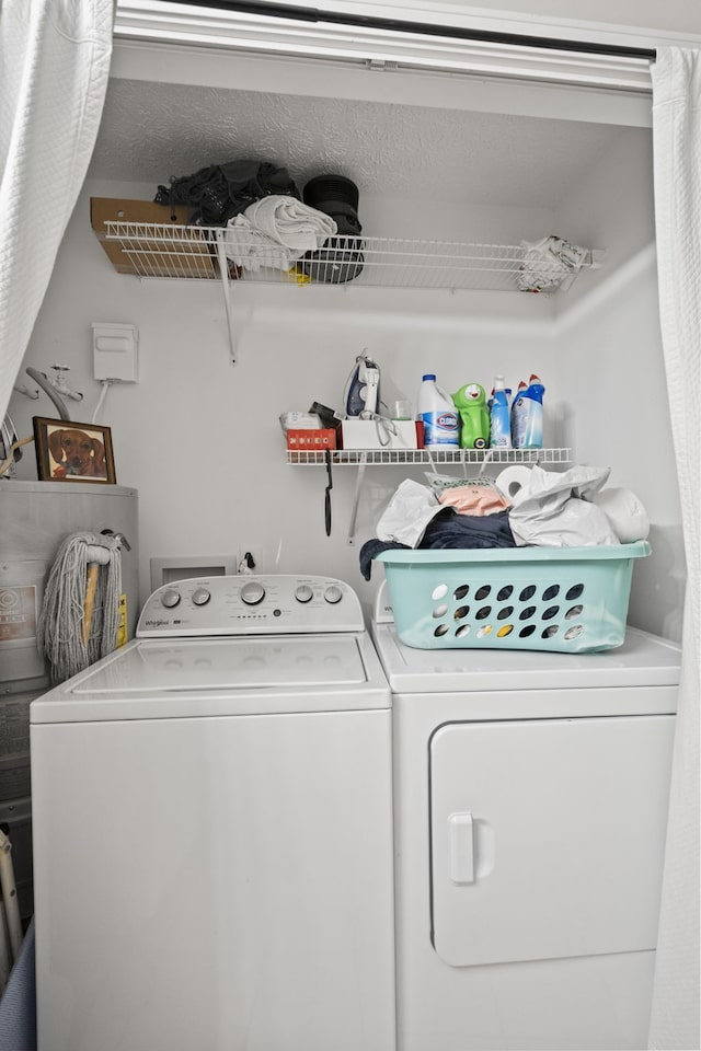 laundry room featuring washing machine and dryer