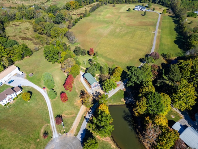 aerial view featuring a rural view and a water view