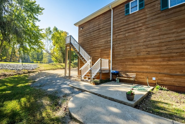 view of home's exterior with a patio