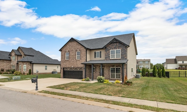 craftsman-style home with a front yard and a garage