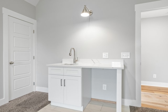 bathroom with vanity and tile patterned flooring