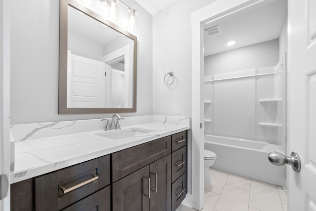 full bathroom featuring vanity, toilet, and bathing tub / shower combination