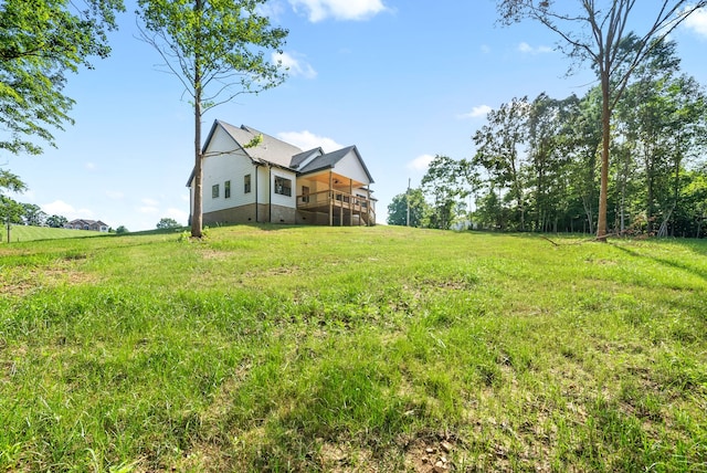 view of yard with a rural view