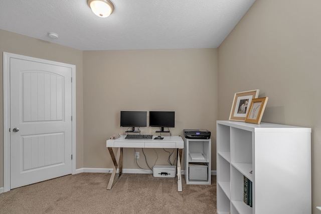 office space featuring a textured ceiling and carpet flooring