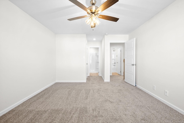 unfurnished bedroom with ceiling fan and light carpet