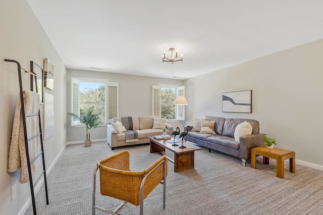 carpeted living room with a healthy amount of sunlight