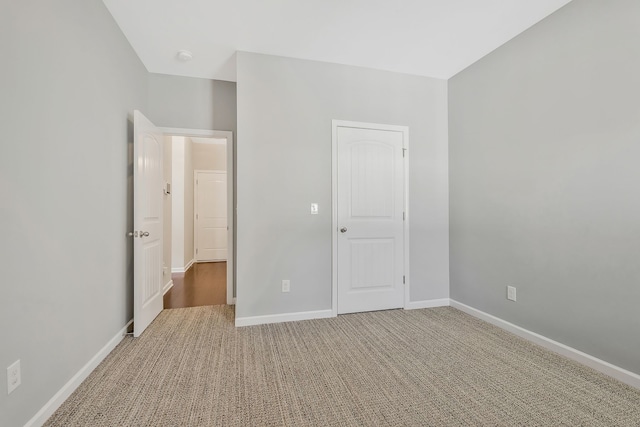 unfurnished bedroom with carpet flooring