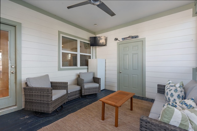 exterior space with ceiling fan