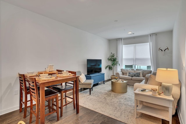 1677 54th Ave N Unit 218, Nashville, TN 37209 - living area featuring dark wood-style floors and baseboards